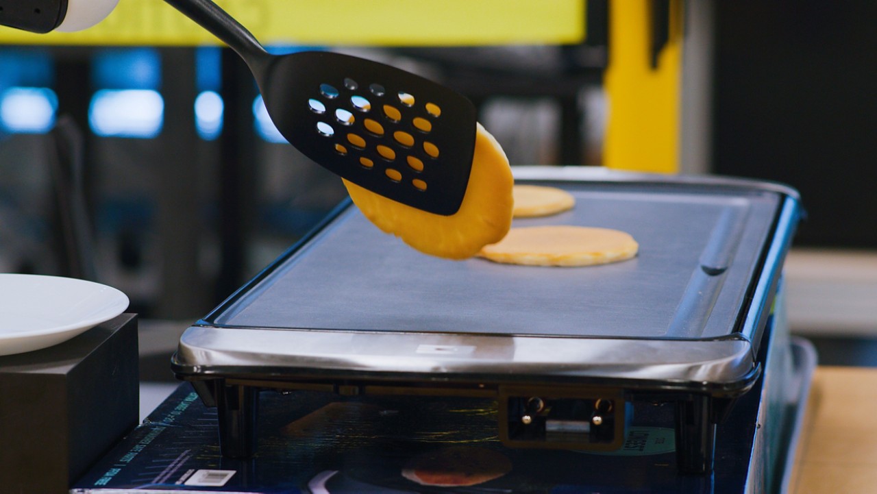 Robot flipping a pancake
