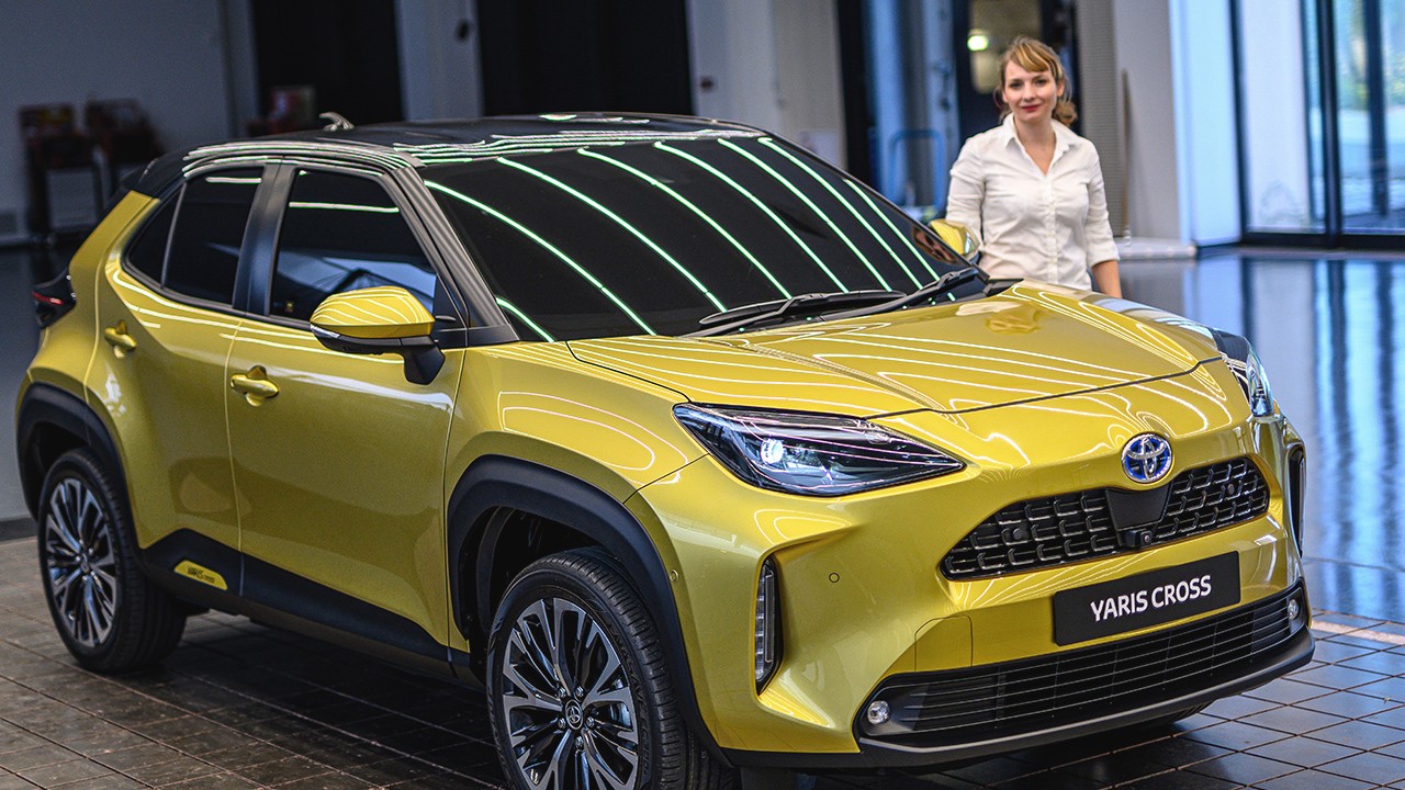 Julie Schwieder nexr to Toyota Yaris Cross