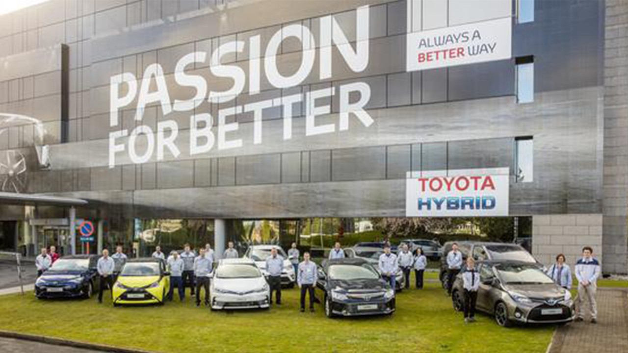 Toyota hybrids in front of TME building