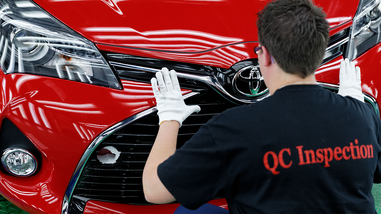 QC inspection on a new Toyota vehicle