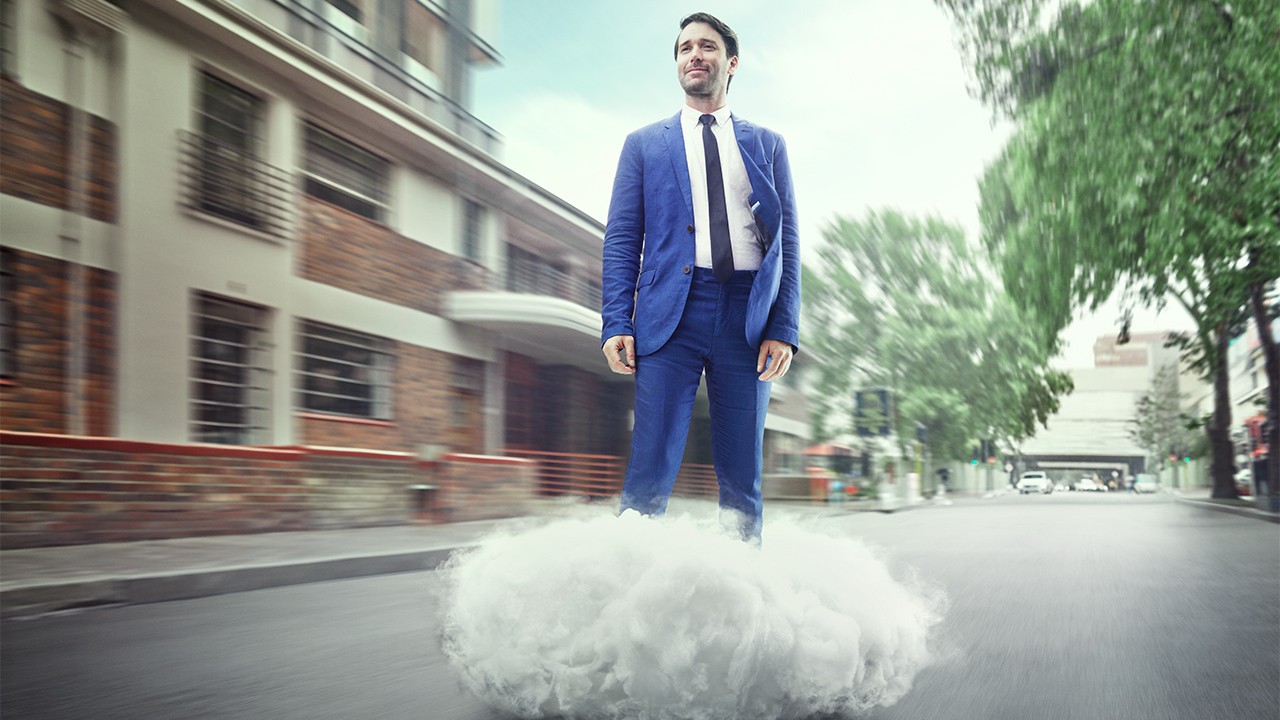 Business man on a KINTO cloud