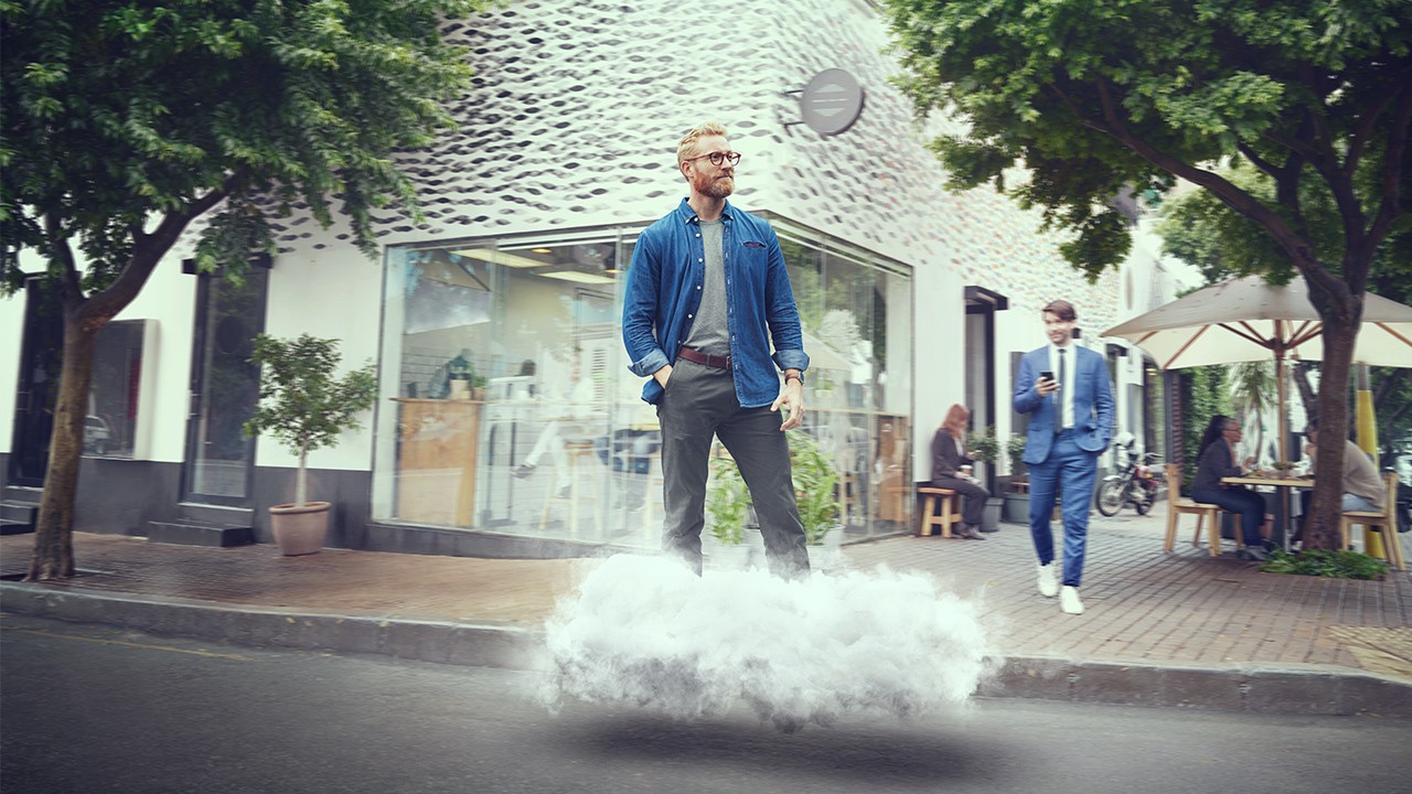 Man standing on a KINTO cloud