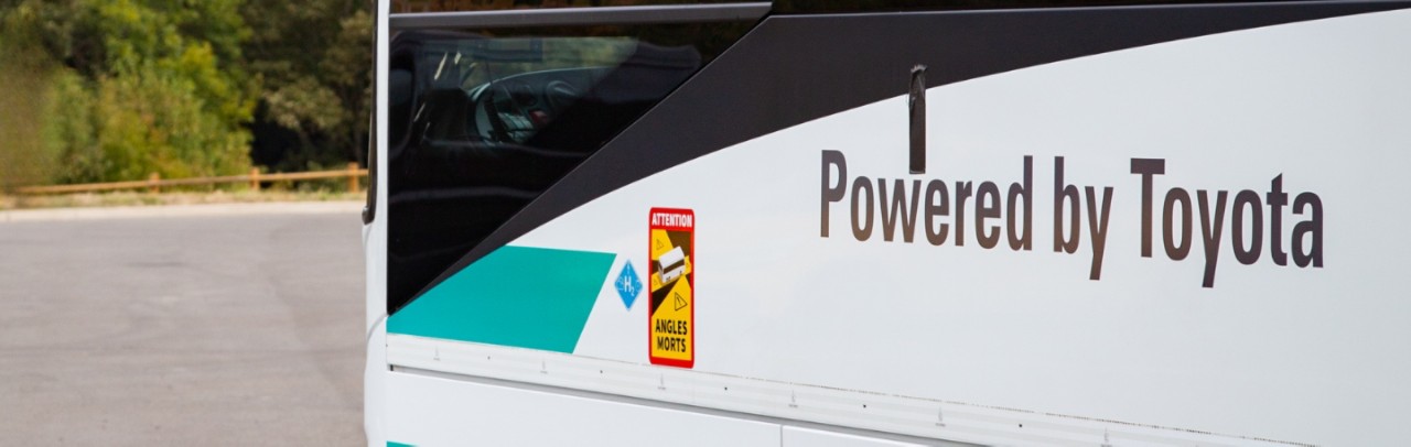 coach image with Powered by Toyota on the side