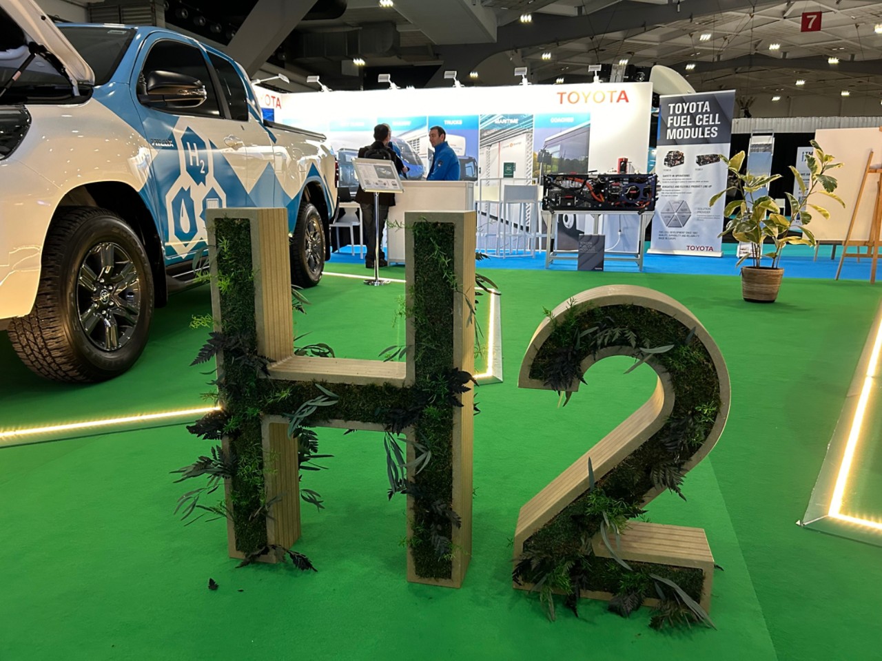 H2 sign in Toyota stand