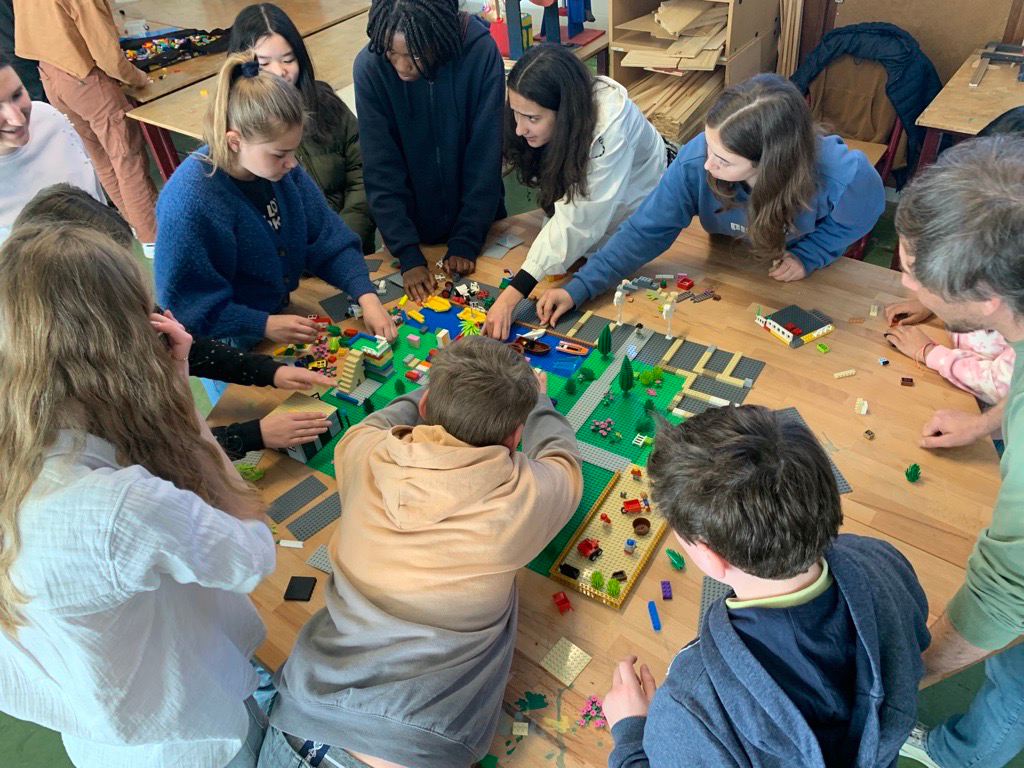 School children playing lego and learning about STEM jobs