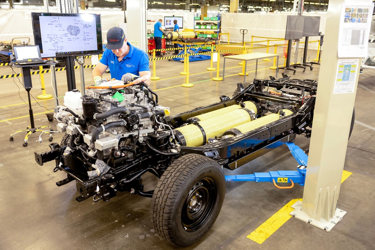 Toyota employee working on the hydrogen Hilux