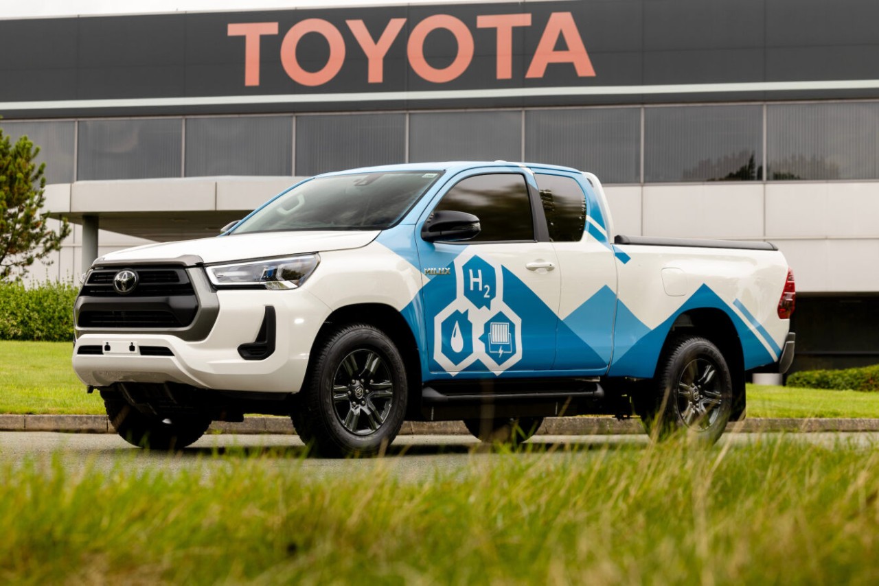 Toyota Hydrogen Hilux in front of a Toyota building