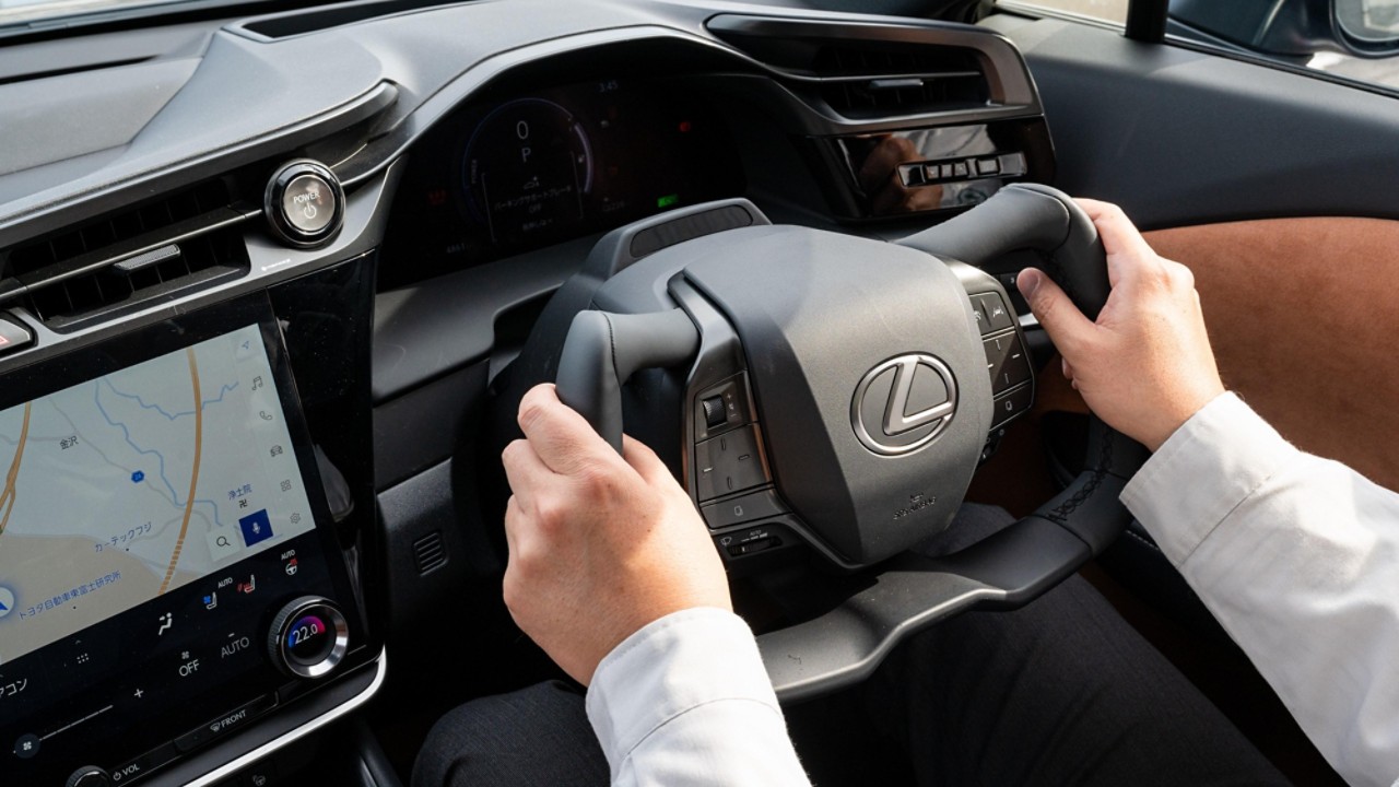 Hands on steer-by-wire wheel in Lexus car