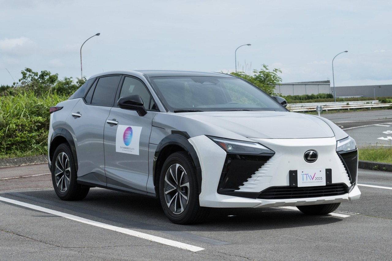 Parked grey Lexus RZ featuring steer-by-wire  