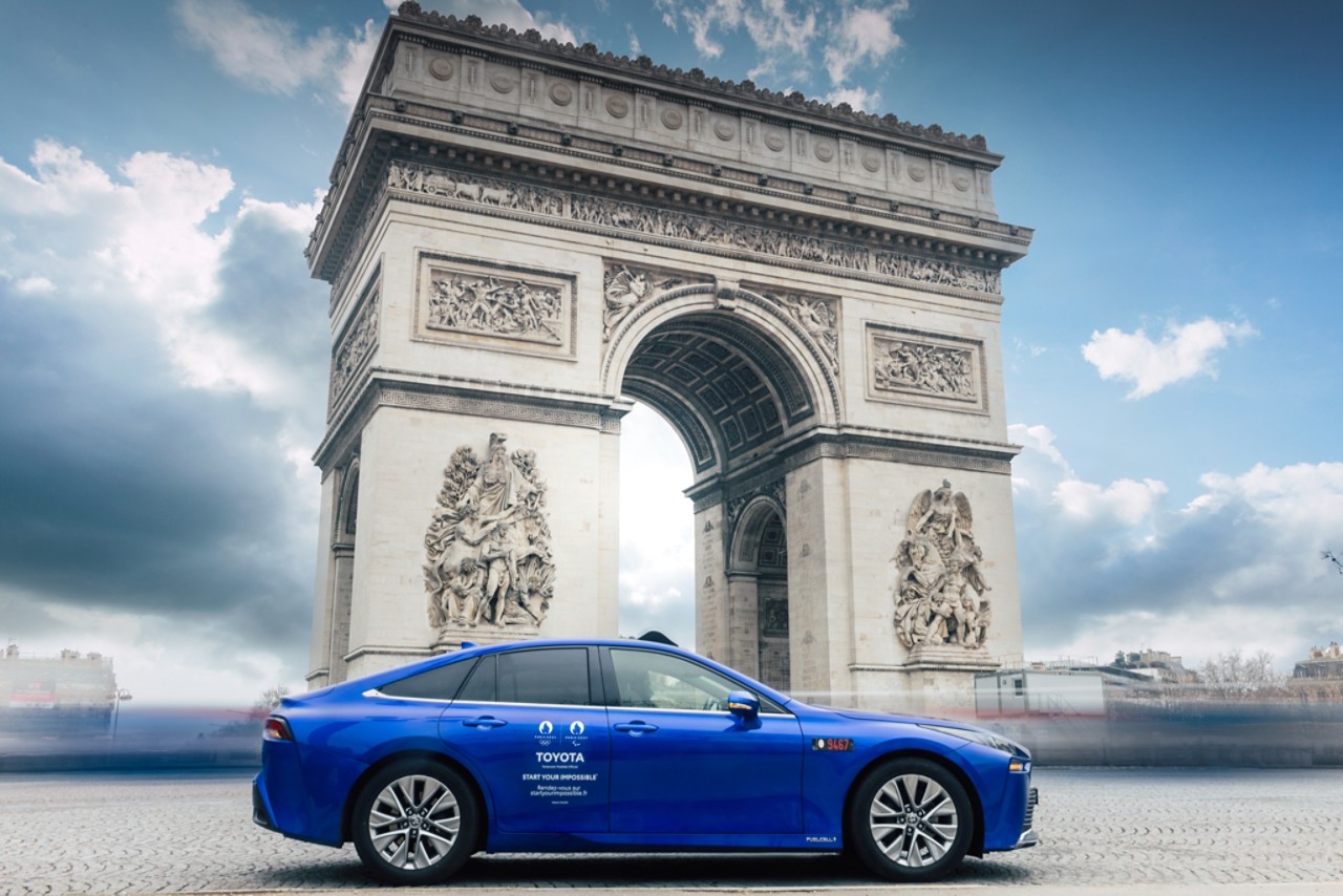 Fuel cell Toyota Mirai in front of Arc de Triomphe in Paris