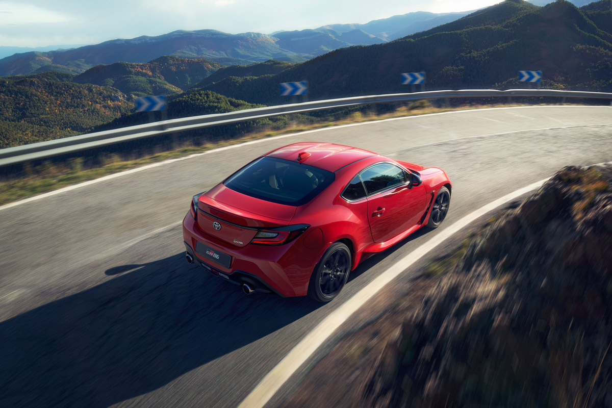 Hero image - Toyota GR86 on the road with GR badge